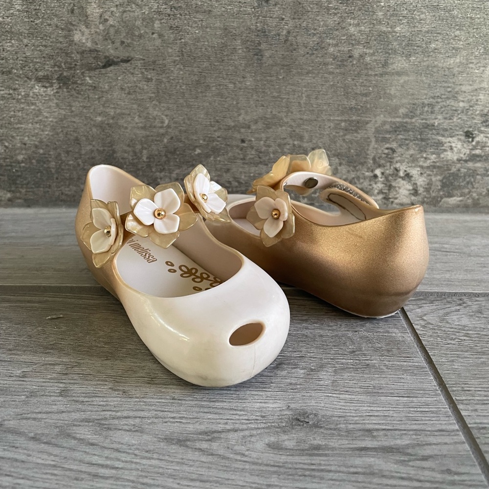 Mini Melissa tan and gold flower shoes